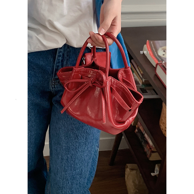 2025 New Women's Handbasket Spring New Fashion Handbag Designer Multi functional Bow Shoulder Bag