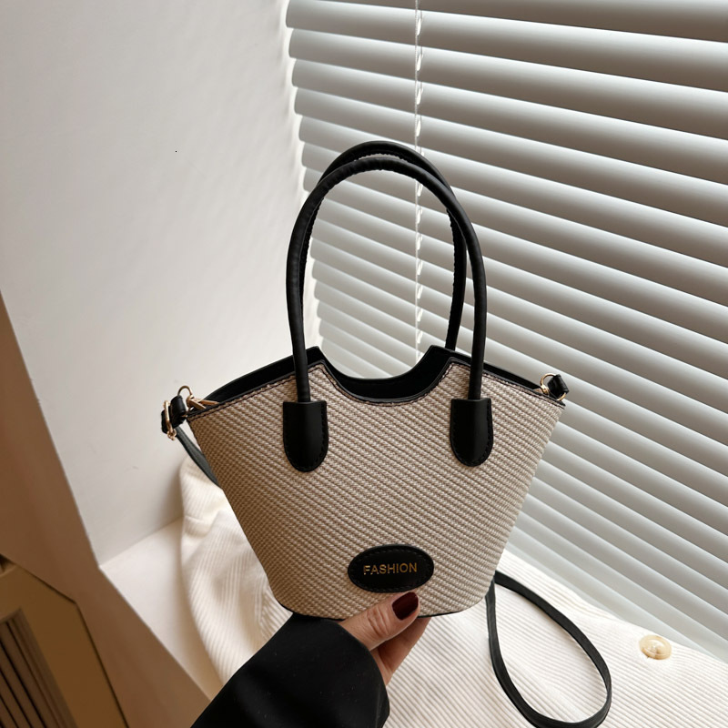 2025 new color blocked niche female fashion designer multifunctional cross body texture handheld bucket bag