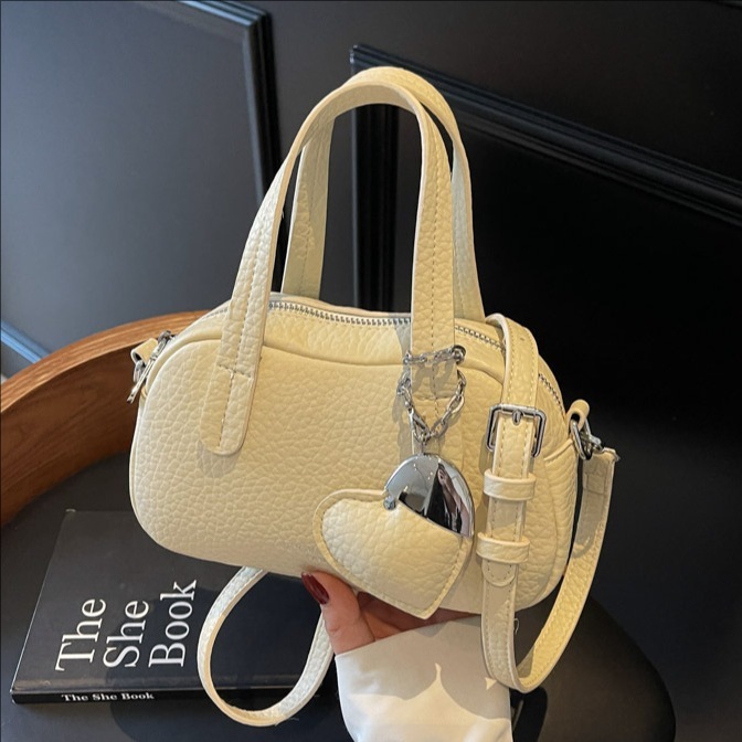 2025 New Lychee Pattern Fashion Designer Women's Handheld Pillow Western style Casual Simple Multi use Shoulder Cross Bag