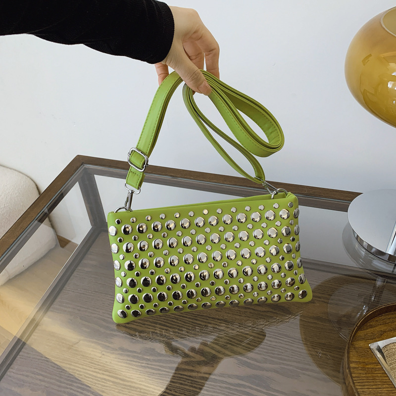 Luxury Brand Designer Bag Personalized Trendy Dot Rivet Hand-Held Women's 2025 New Motorcycle Versatile Armpit Tote Bag