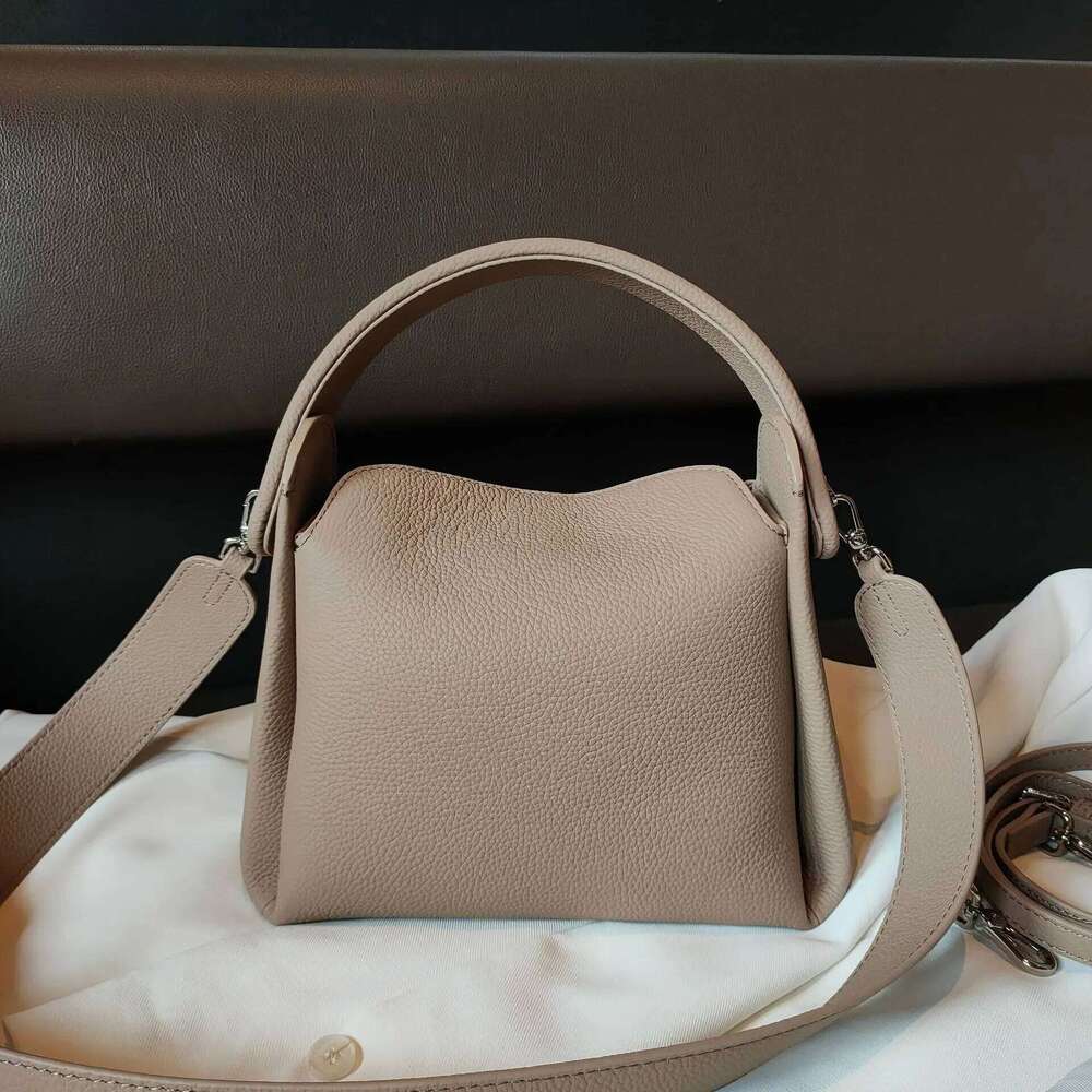 Genuine women's with large capacity and unique cigarette box design Made of soft leather one shoulder crossbody bag