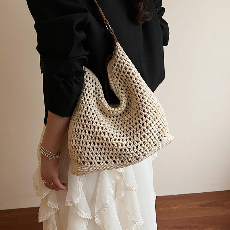 2025 new summer fashion hollow woven designer women's new style simple temperament single shoulder large capacity vacation women's bag