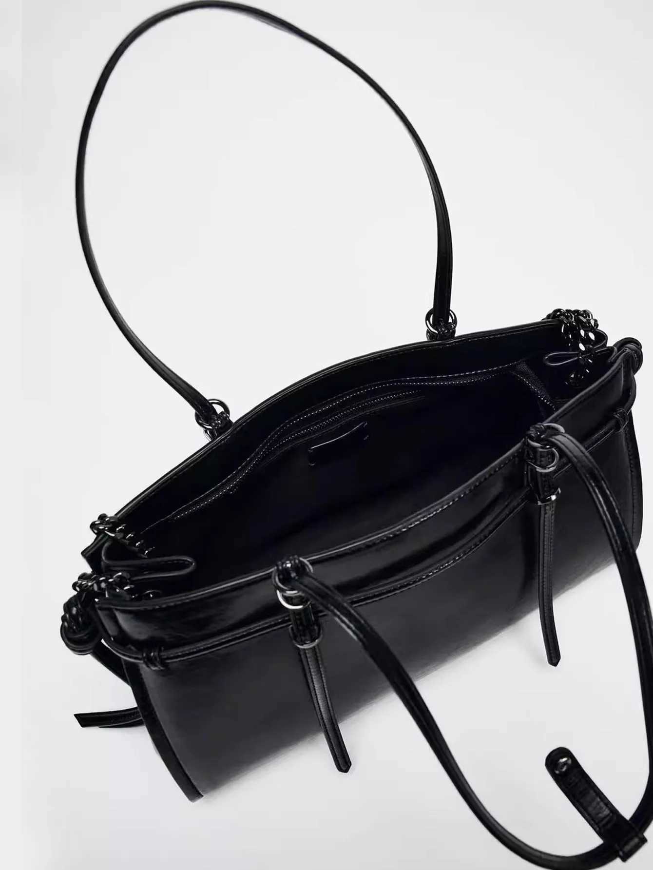 New atmospheric handheld womens bag black extended version double shoulder strap fashionable and simple casual shoulder bag Y250528