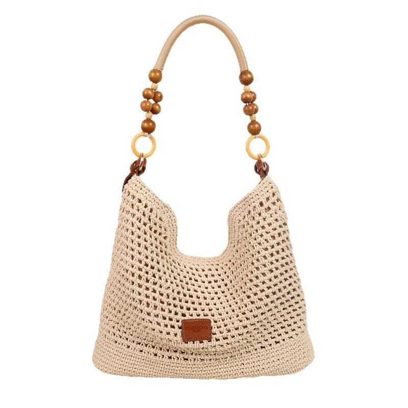 Spring Summer Fashion Hollow Weaving Bag for Womens Simple Shoulder Bag Large Capacity French Commuter Crossbody