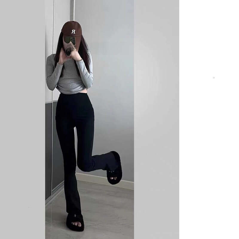 women outfit featuring flared pants highstretch fabric sculpting fit leggings pilates yoga designer with flatlock seams elastic waistband comfort