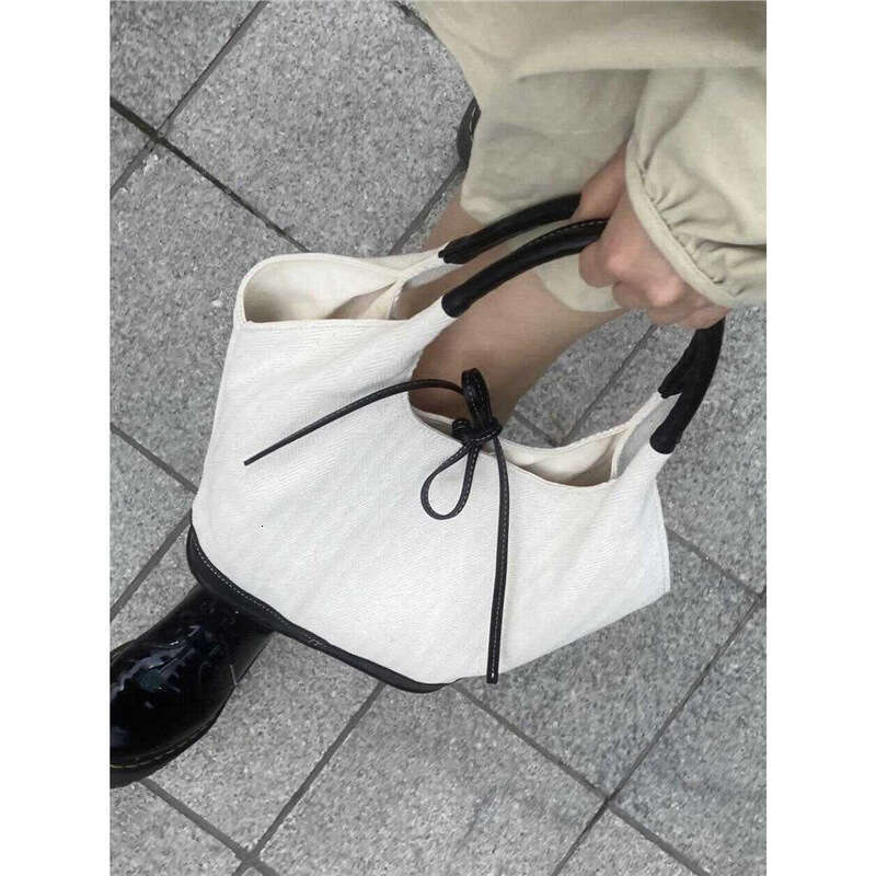 Niche Black and White Patchwork Canvas Tote 2024 New Large Capacity Versatile Commuter Handbag Shoulder Bag for Women
