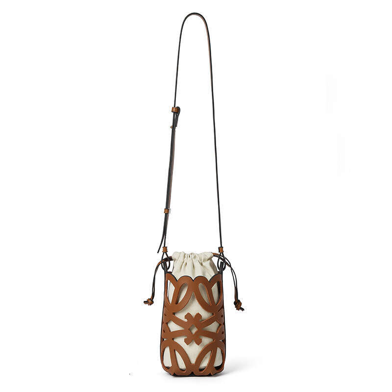 2024 New Crossbody Bucket Hollow Drawstring Canvas Inner Pocket Niche Design Fashion Versatile Mini Bag