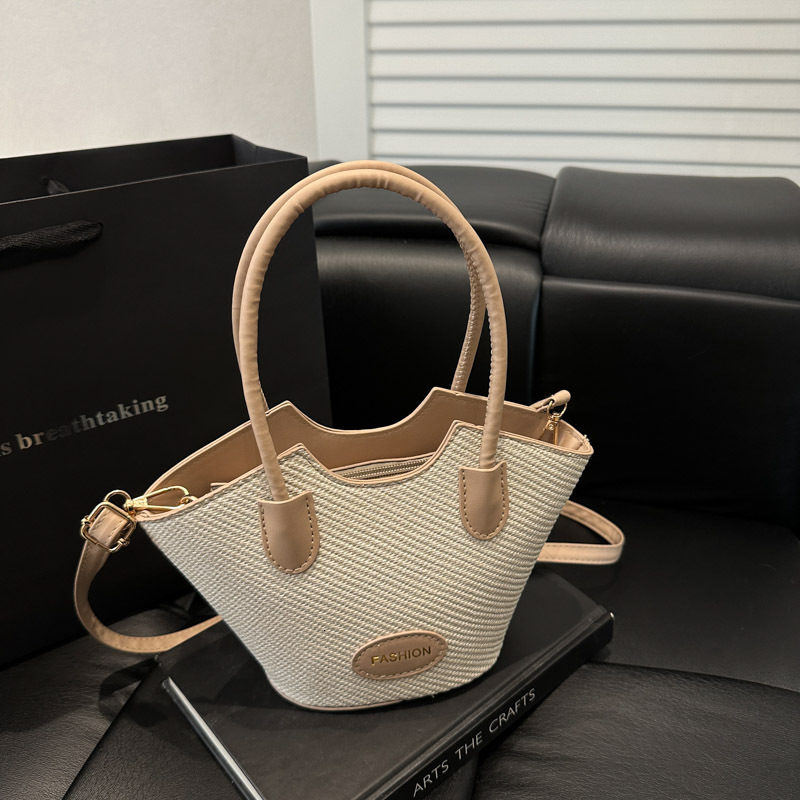 2025 new color blocked niche female fashion designer multifunctional cross body texture handheld bucket bag