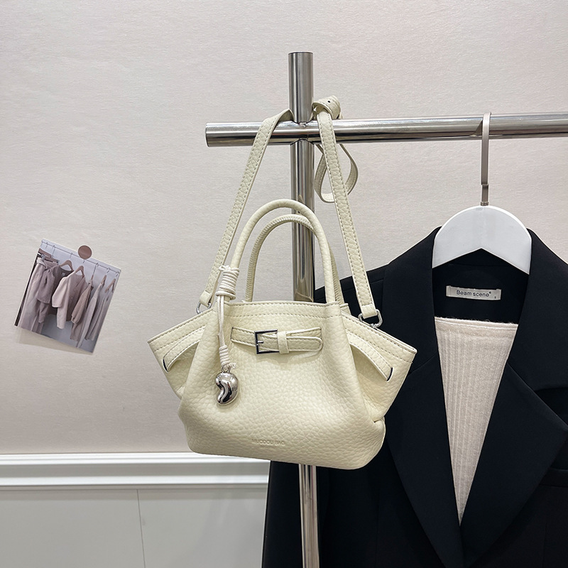 2025 New Summer Fashion Pulling Rope Dumplings Handheld Single Cross Shoulder Designer Women's Bag Trendy Shoulder Bag
