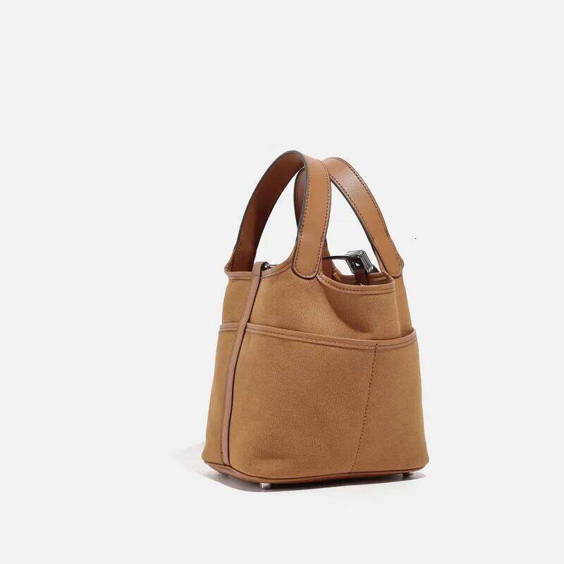 Niche Design Canvas Bucket Women's Single Shoulder Bag Hip Hop Style Polyester Lining Open Top Handbag From China