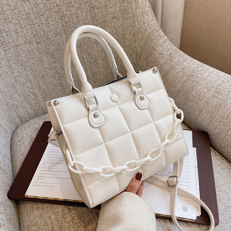 Spring and summer new texture women's bag new fashion simple crossbody bag new personalized handheld bag solid color designer style single should