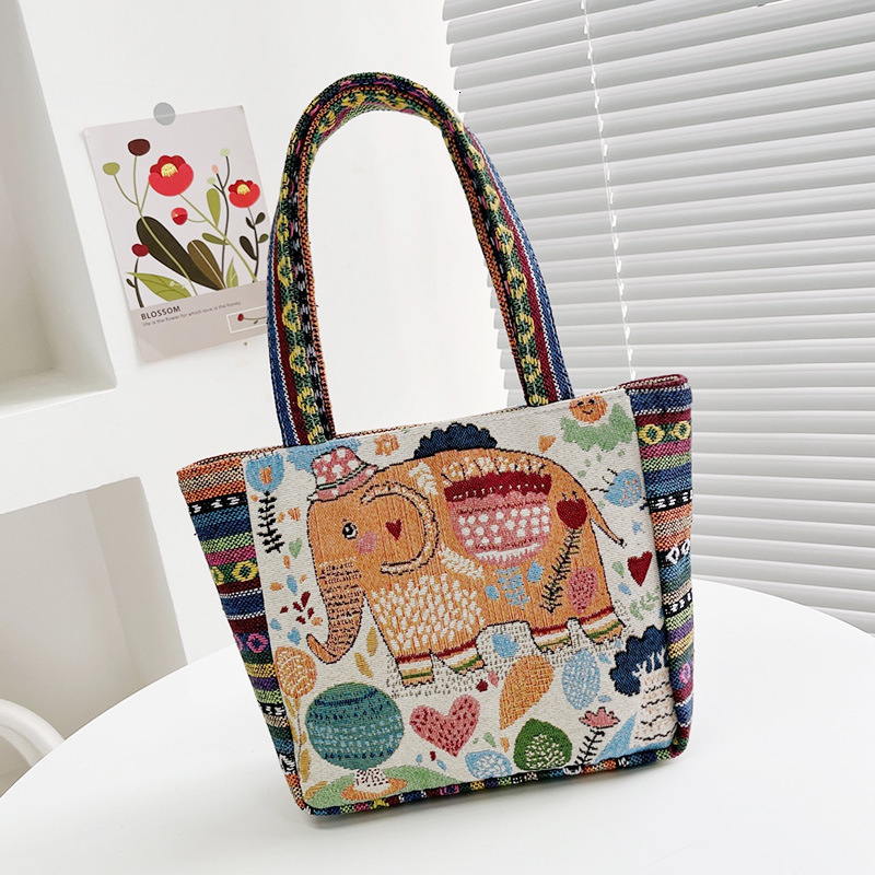 Top brand high-quality new item free delivery designer bag ethnic style embroidery handbag double-sided pattern handbag suitable for office workers