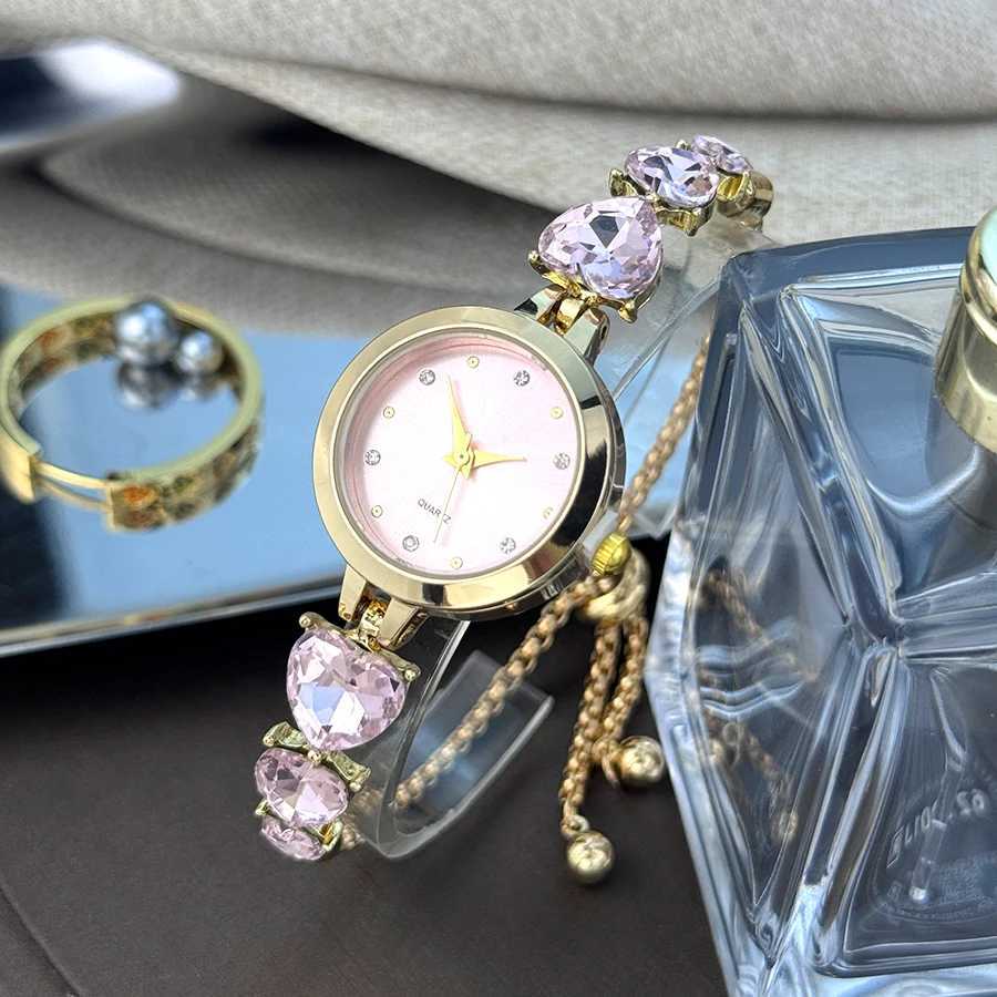 Ladies quartz watch with three heart-shaped diamond-encrusted bracelet round alloy case and mixed scale simple light luxury XJ250527