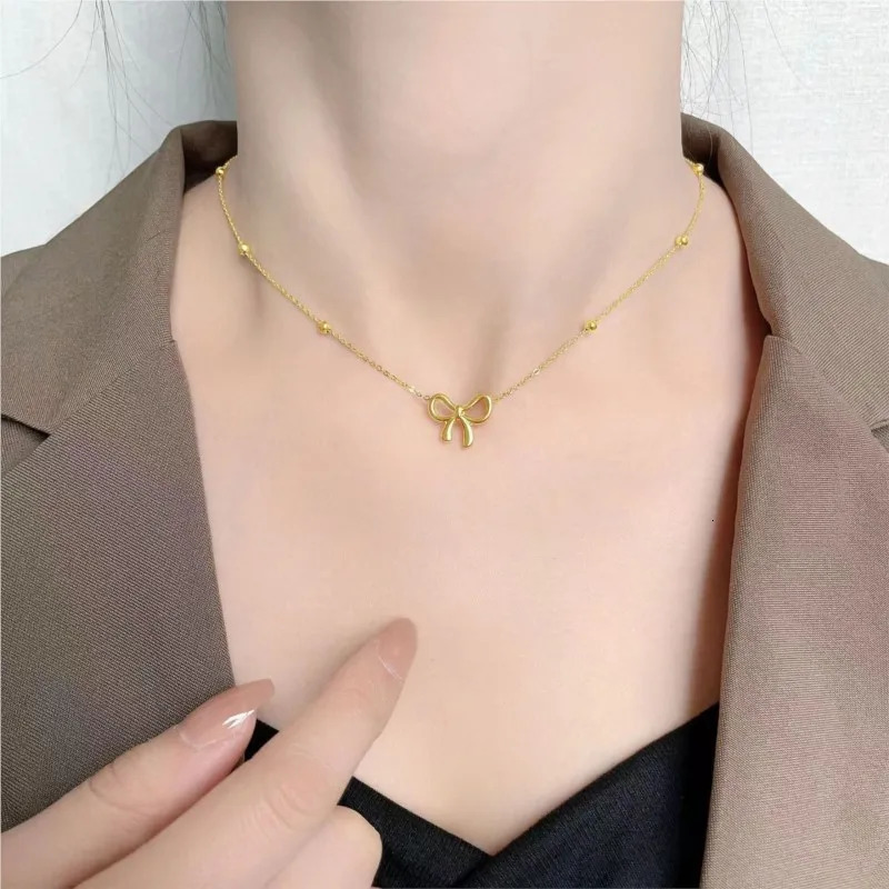 ANENJERY L316 Stainless Steel Beads Chain Hollow Bowknot Pendant Necklace for Women Niche Simple Jewery Accessory 250519