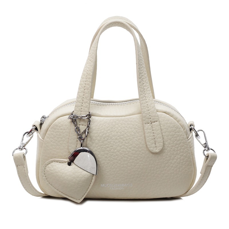 2025 New Lychee Pattern Fashion Designer Women's Handheld Pillow Western style Casual Simple Multi use Shoulder Cross Bag