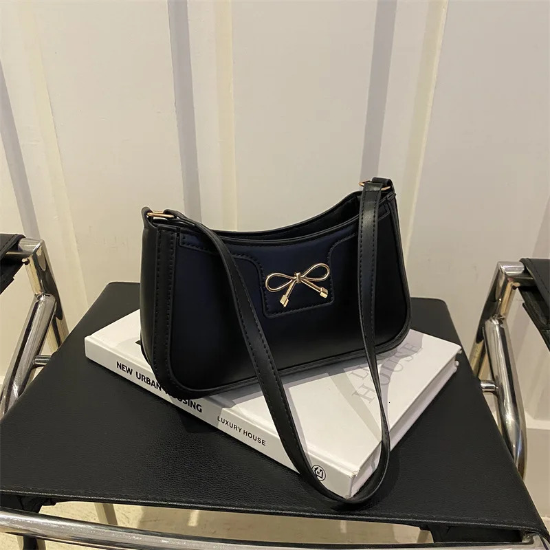 Stylish Shoulder Bag with Metal Bow Decoration Versatile Underarm Bag Classic Brown and Black Baguette Bag for Women Daily Use 250526
