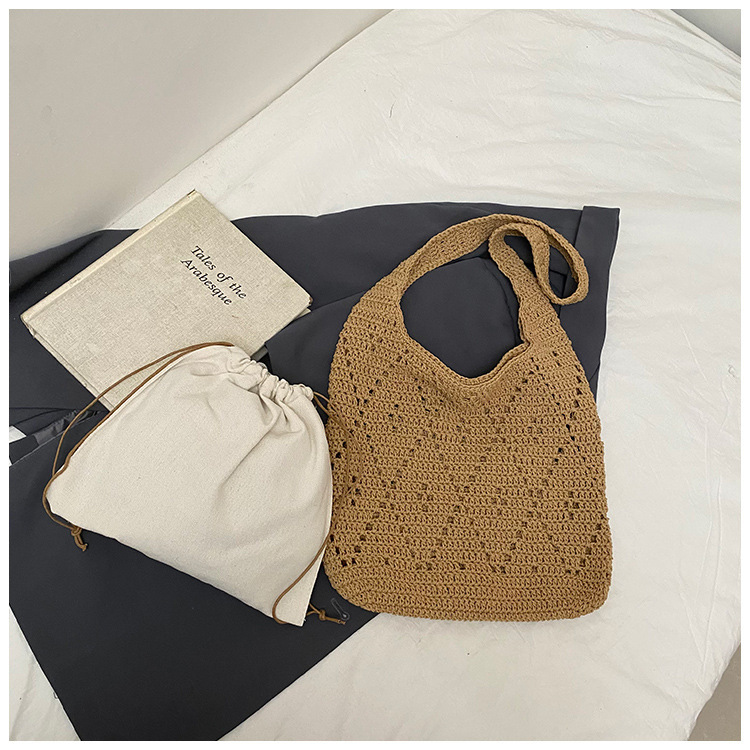 2025 New French Hollow Cotton Thread Weaving Large Capacity Sweet Needle Hook Shoulder Bag Designer Fairy Vacation Handheld Beach Bag