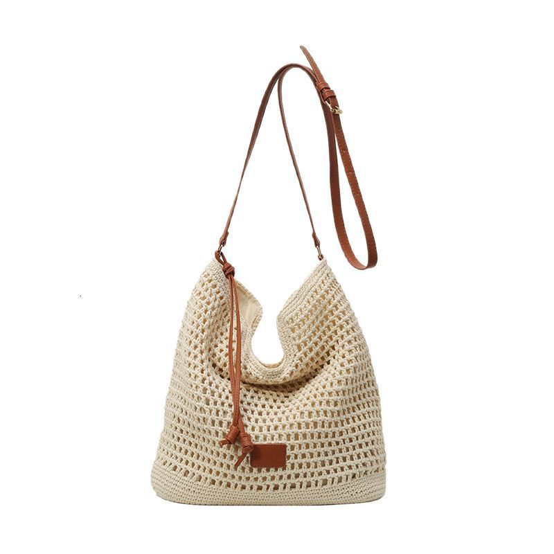 2025 New Outdoor Beach Resort Single Shoulder Designer Women's New Hollow Weaving Commuter Large Capacity Bucket Bag