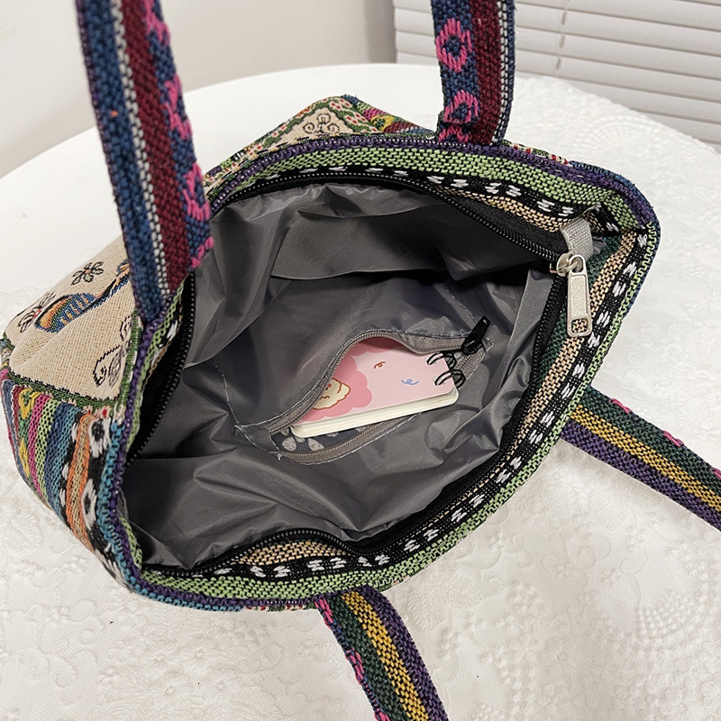 Top brand high-quality new item free delivery designer bag ethnic style embroidery handbag double-sided pattern handbag suitable for office workers