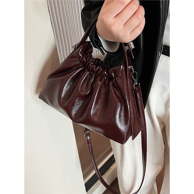 New women's bag small design unique pleated cloud bag new multifunctional commuting handbag fashion shoulder crossbody bag solid color retro desi
