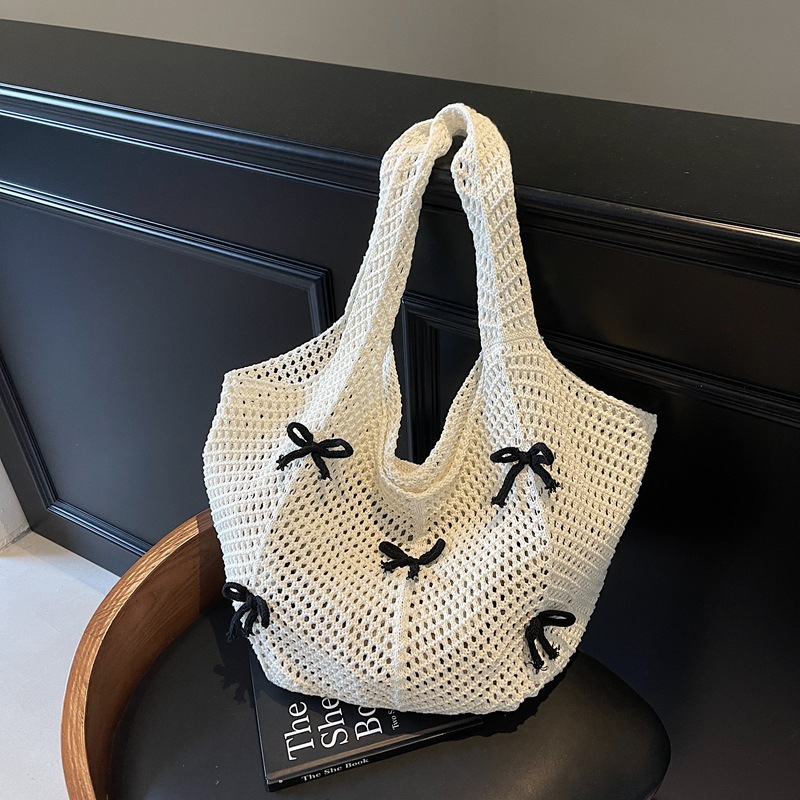 2025 New Summer Fashion Knitted Designer Women's Hollow Handbag New Fashion Knitted Bow Beach Shoulder Bag Trend