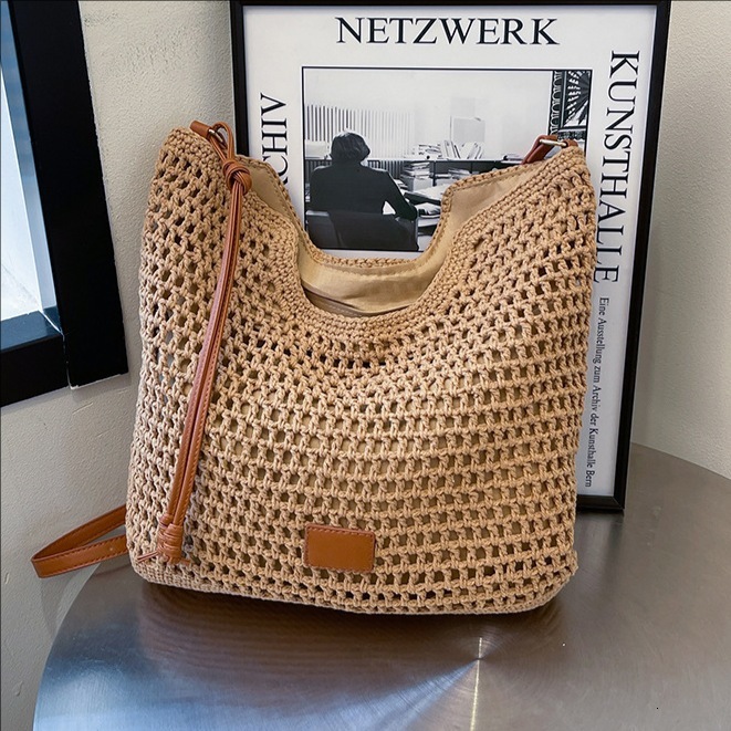 2025 New Outdoor Beach Resort Single Shoulder Designer Women's New Hollow Weaving Commuter Large Capacity Bucket Bag