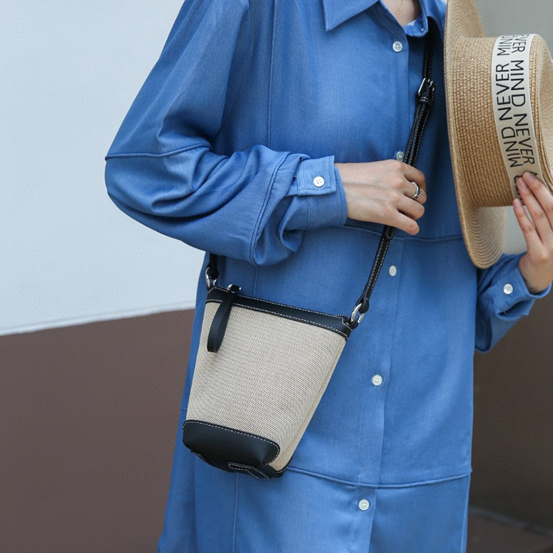 2025 Fashion New Small Phone Women's High end Designer Multi functional One shoulder Slant Body with Leather Canvas Bag