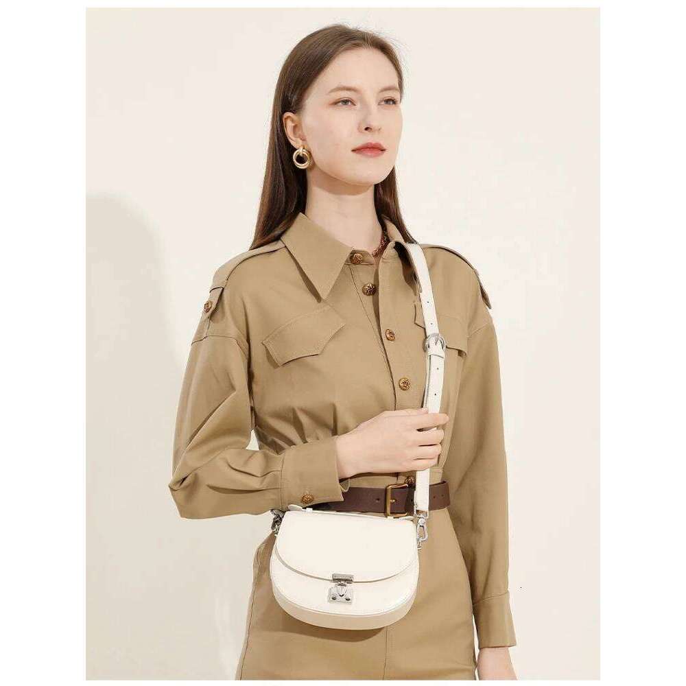 Original Design Beige Color Round Shape Saddle Flap Hard Cow Leather Women Shoulder Crossbody Bag Small