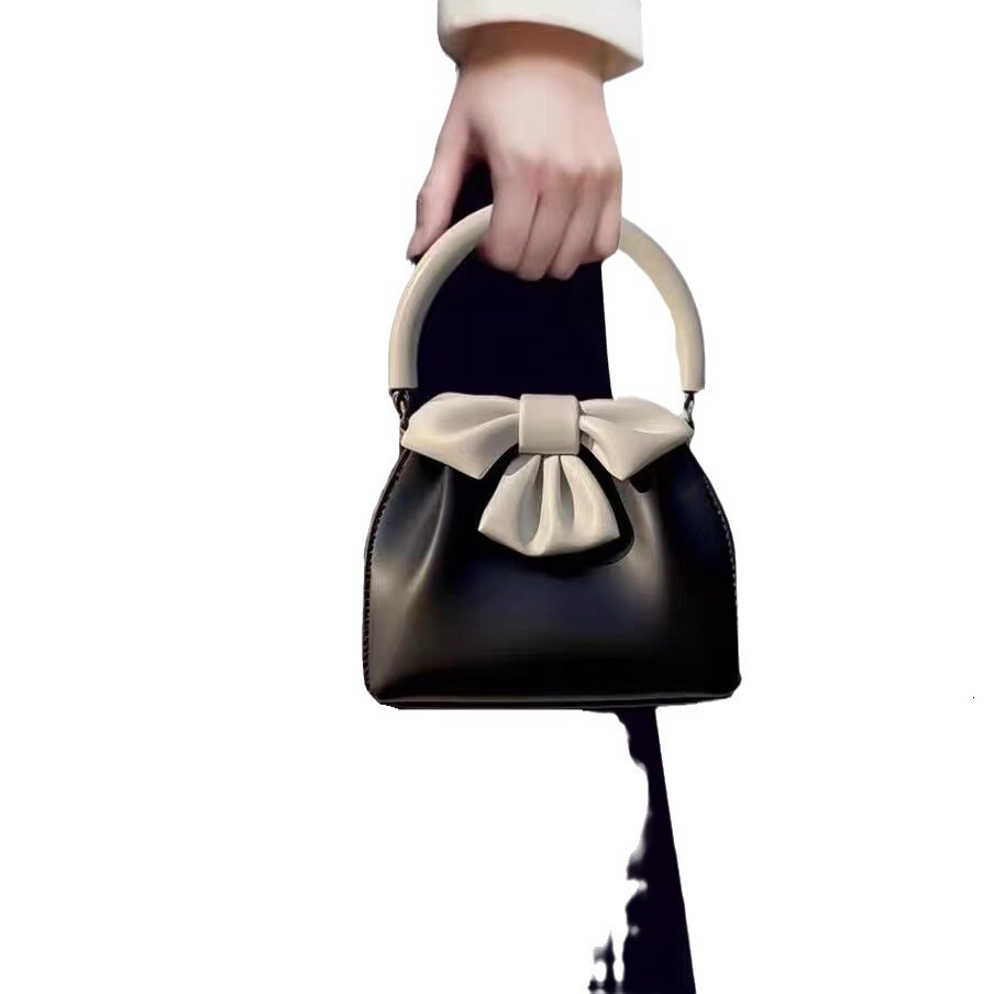 Top brand high-quality new free designer 2025 new French color block bow pleated handbag black handbag new free designer handbag