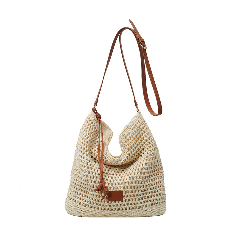 2025 New Outdoor Beach Resort Single Shoulder Designer Women's New Hollow Weaving Commuter Large Capacity Bucket Bag
