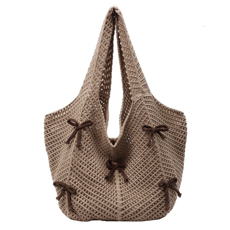 2025 New Summer Fashion Knitted Designer Women's Hollow Handbag New Fashion Knitted Bow Beach Shoulder Bag Trend