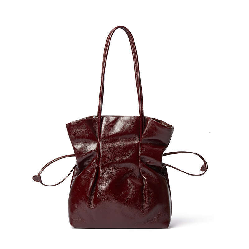 New French Style Niche Cowhide Handbag Lucky Shoulder Underarm Vase Small Waist Drawstring Fashion Women's Bag