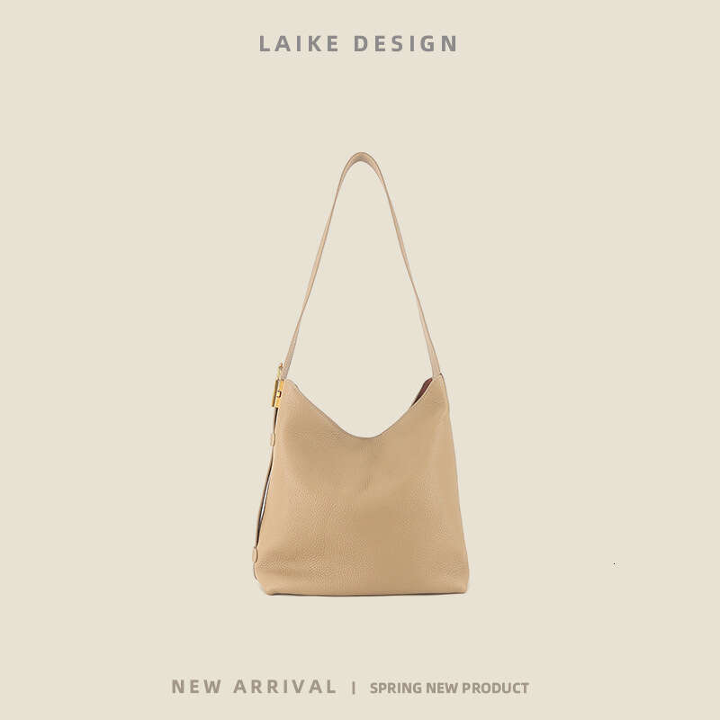 Summer New Niche Top Layer Cowhide Locking Wandering Genuine Leather Women's Commuter Large Capacity High-end Tote Bag