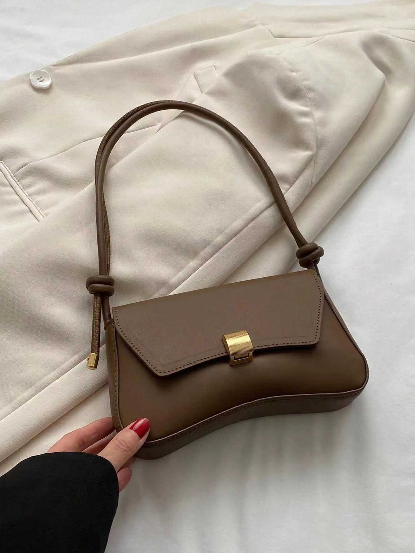 Fashionable womens armpit bag metal buckle decoration design shoulder bag suitable for shopping commuting and travel. Y250528