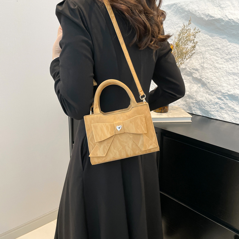 Top Brand High Quality New Style High-end Fashion Handbag with Bowknot Simple Shoulder and Crossbody Bag Versatile Bag for Available New Free Delivery