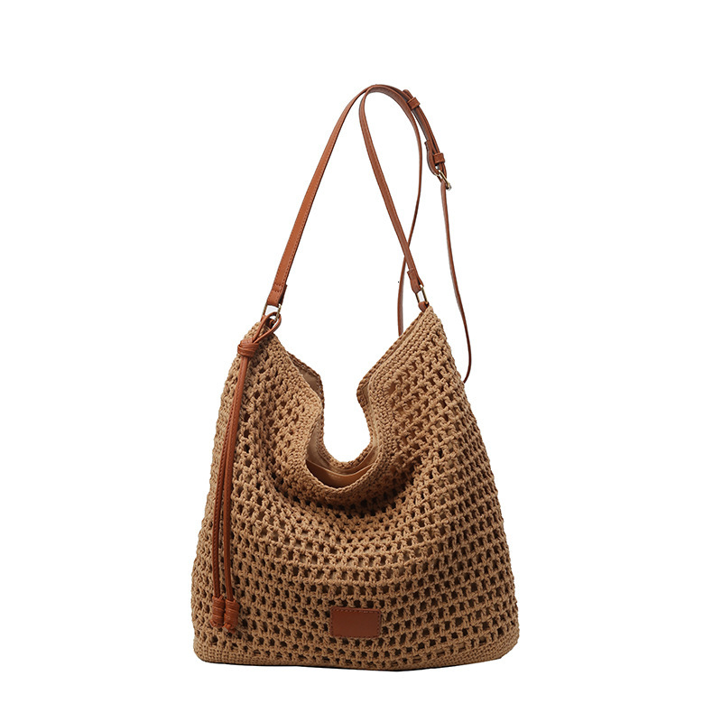2025 New Outdoor Beach Resort Single Shoulder Designer Women's New Hollow Weaving Commuter Large Capacity Bucket Bag
