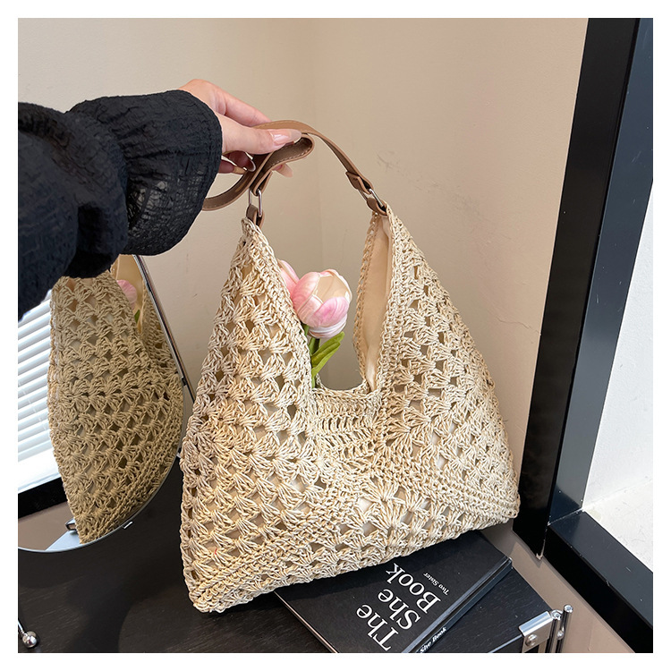 2025 new women's new hollow design beach vacation grass woven bag designer multifunctional single shoulder handbag