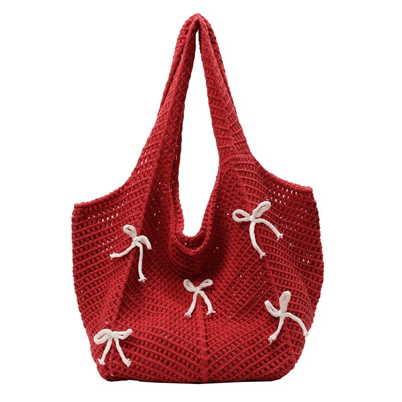 2025 New Summer Fashion Knitted Designer Women's Hollow Handbag New Fashion Knitted Bow Beach Shoulder Bag Trend