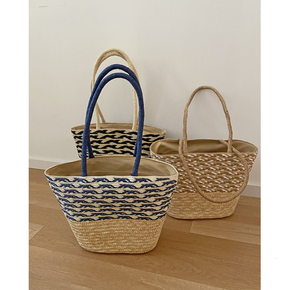 2025 New Large Capacity Women's New Summer Fashion Commuter Korean Edition Grass Weaving Designer Multi functional Leisure Shoulder Bag