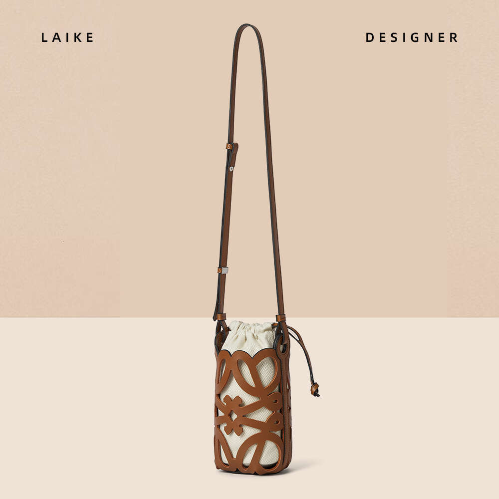 2024 New Crossbody Bucket Hollow Drawstring Canvas Inner Pocket Niche Design Fashion Versatile Mini Bag