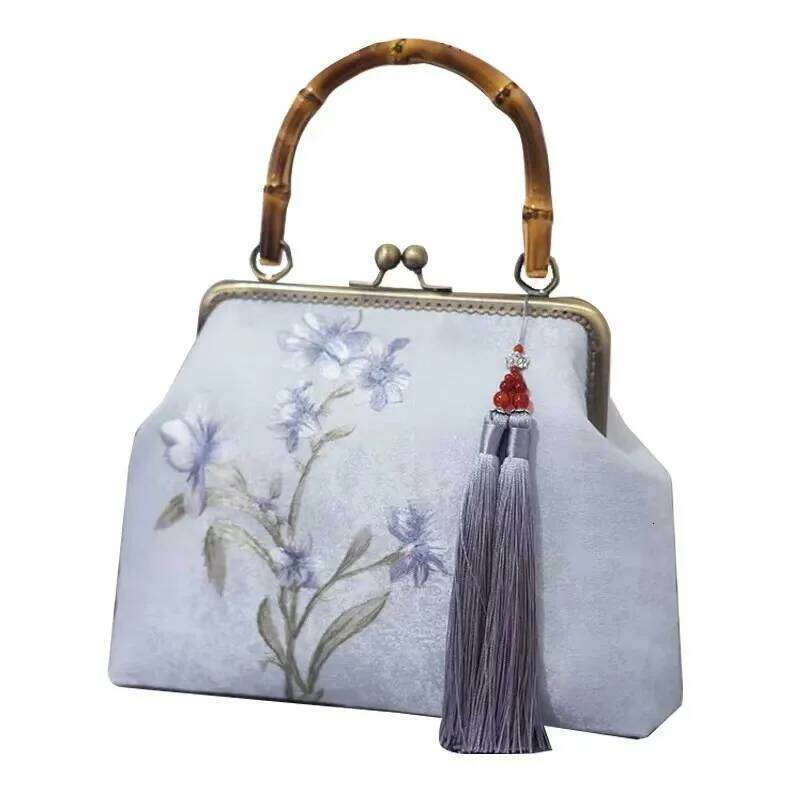 Luxurious and elegant embroidered silk geometric pattern Chinese style bamboo handle gift bag for middle-aged mother with tassel