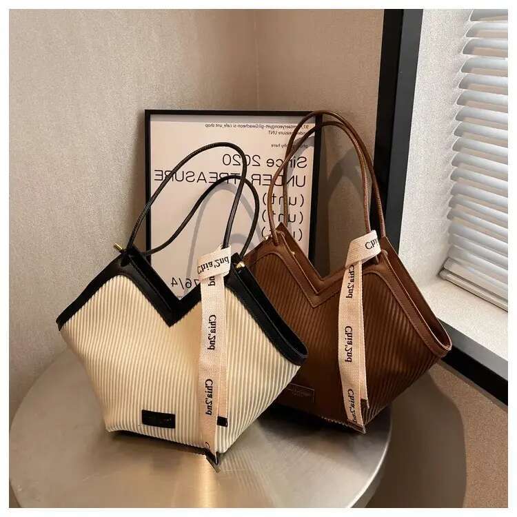 Free delivery Designer Shoulder Bag Spring 2025 New fashion knitted skew art bag for women (with size code tilt to see clearly order)