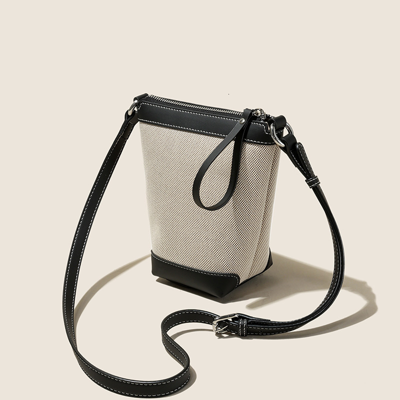 2025 Fashion New Small Phone Women's High end Designer Multi functional One shoulder Slant Body with Leather Canvas Bag