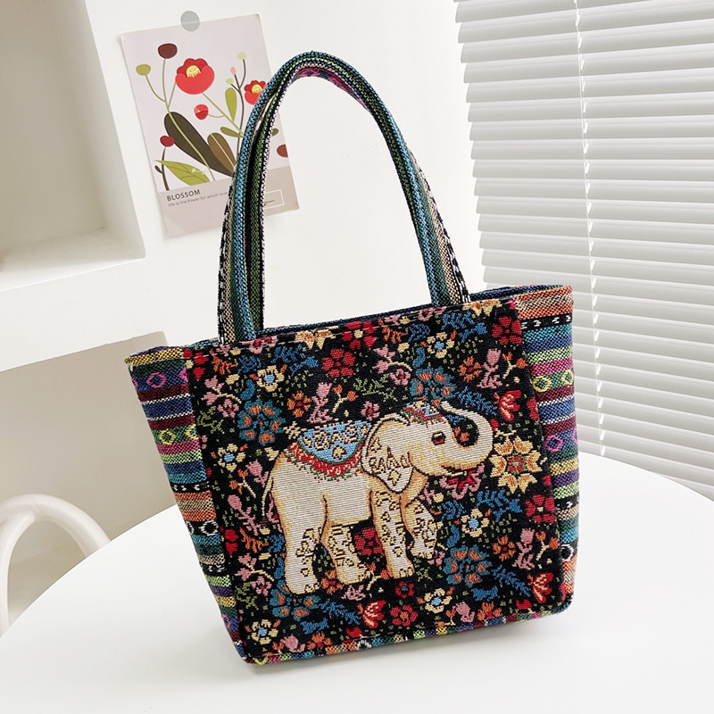 Top brand high-quality new item free delivery designer bag ethnic style embroidery handbag double-sided pattern handbag suitable for office workers