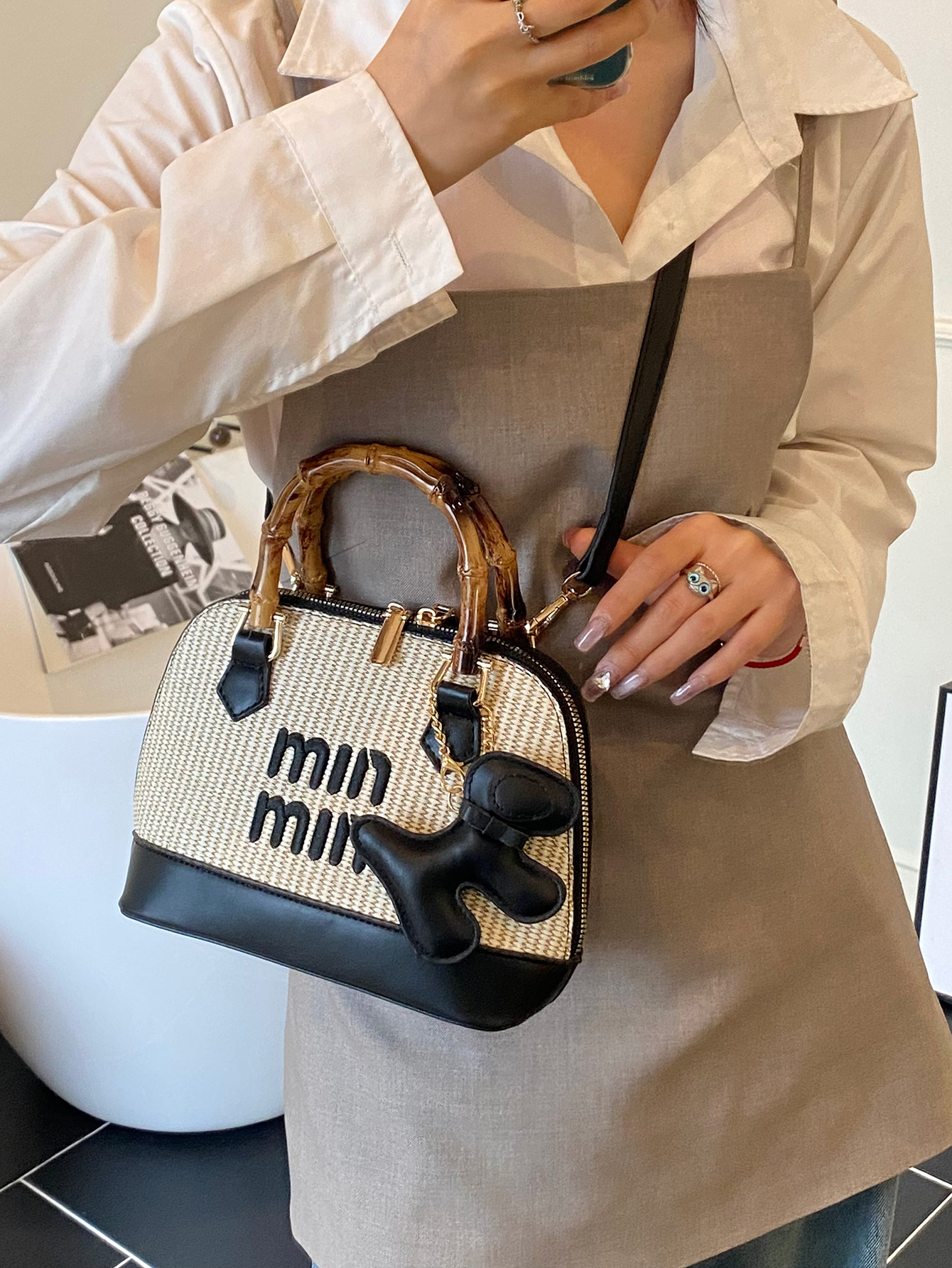 Free shipping designer bags, cross-border shell woven bags, 2025 bamboo joint straw woven hand bill of lading, shoulder cross-shoulder bags, women