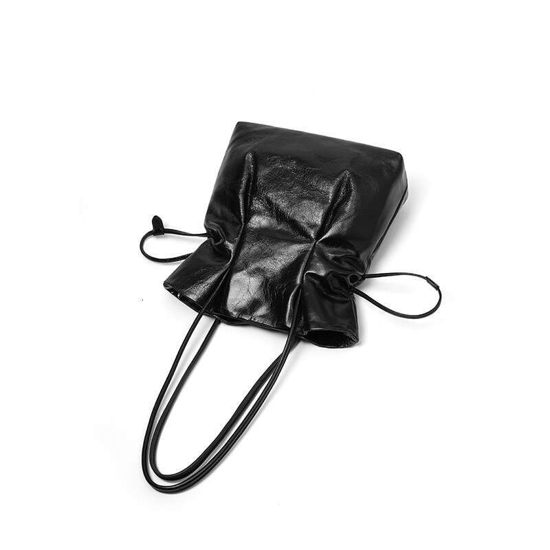 New French Style Niche Cowhide Handbag Lucky Shoulder Underarm Vase Small Waist Drawstring Fashion Women's Bag