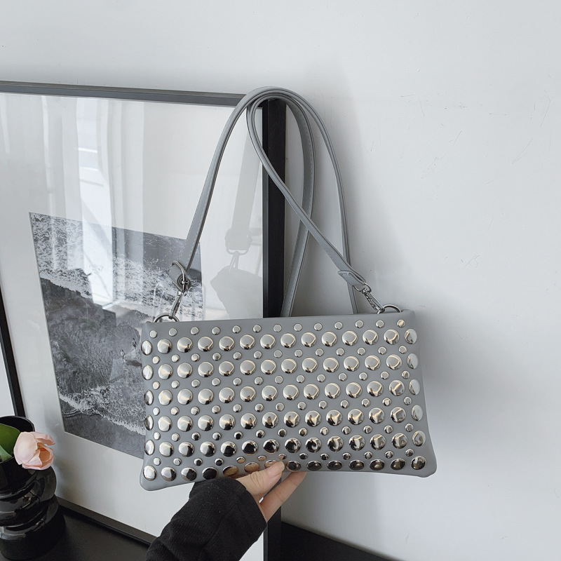 Luxury Brand Designer Bag Personalized Trendy Dot Rivet Hand-Held Women's 2025 New Motorcycle Versatile Armpit Tote Bag