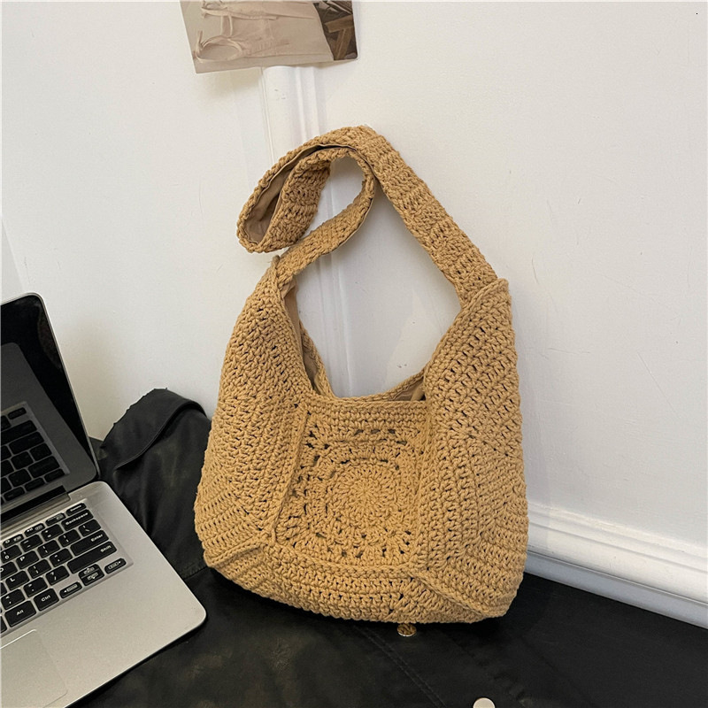 2025 new single shoulder large capacity cotton thread new grandmother grid grass woven vacation beach bag designer multifunctional women's bag
