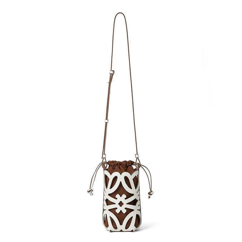 2024 New Crossbody Bucket Hollow Drawstring Canvas Inner Pocket Niche Design Fashion Versatile Mini Bag