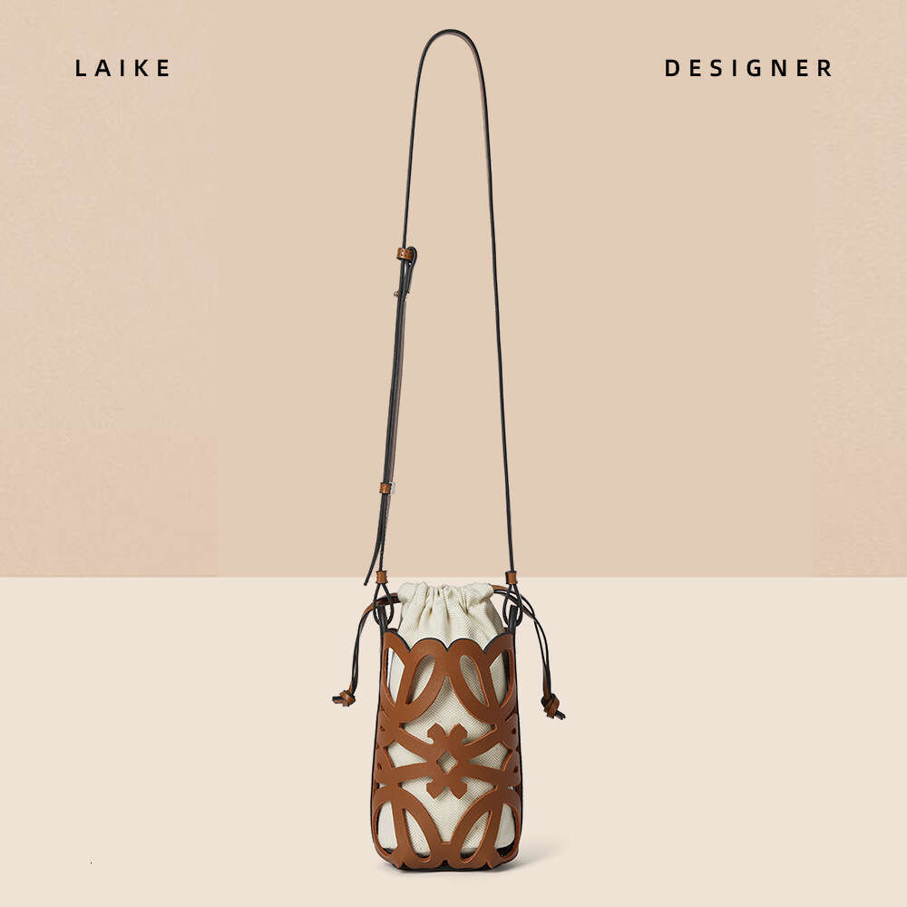 2024 New Crossbody Bucket Hollow Drawstring Canvas Inner Pocket Niche Design Fashion Versatile Mini Bag